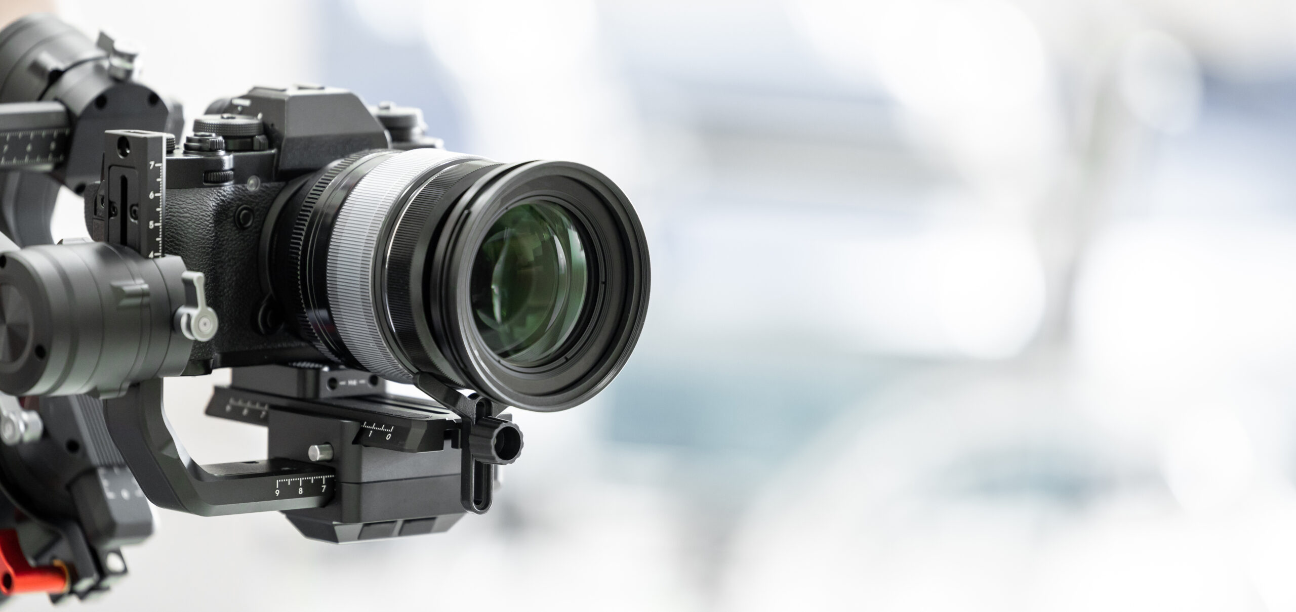 Gimbal video camera, Videographer using dslr camera anti shake t - Video Confessional Booths from Lucky Frog Photo Marketing OC: Authentic Connections in Orange County